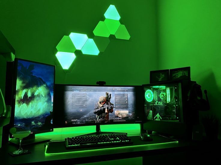 Premium gaming station setup with dynamic green backlighting